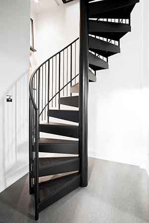 mini spiral stair with steel steps and spindles