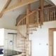 all oak spiral stair with oak beams above