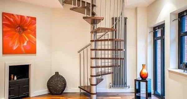 walnut and stainless steel spiral in a house with red flower picture