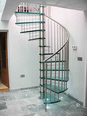 white wall living area with a glass spiral staircase