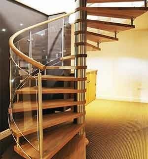 spiral stair set in a room with sparkly black wall behind
