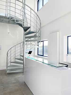 galvanised spiral staircase a office setting