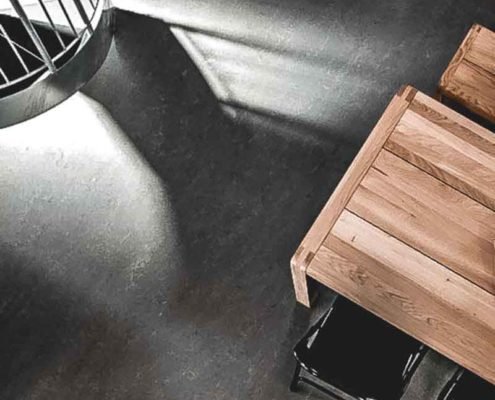 concrete floor and wooden table