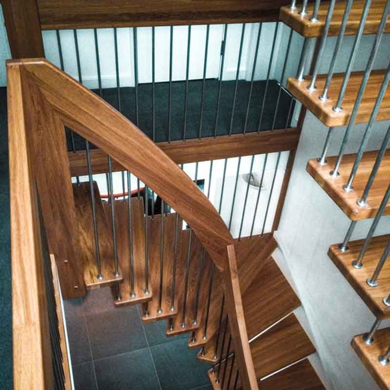 looking down on two wooden open stairs