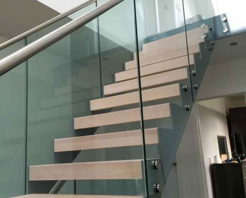 straight stair with glass panels to both sides
