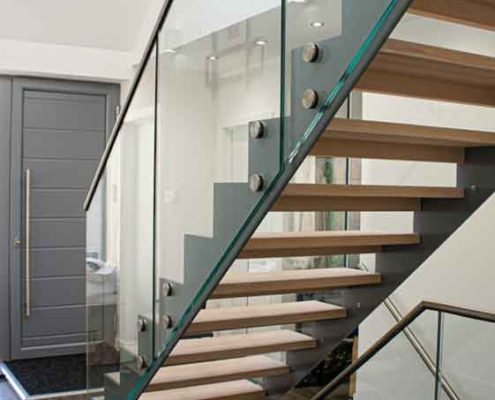 Glass panels on side of modern stair