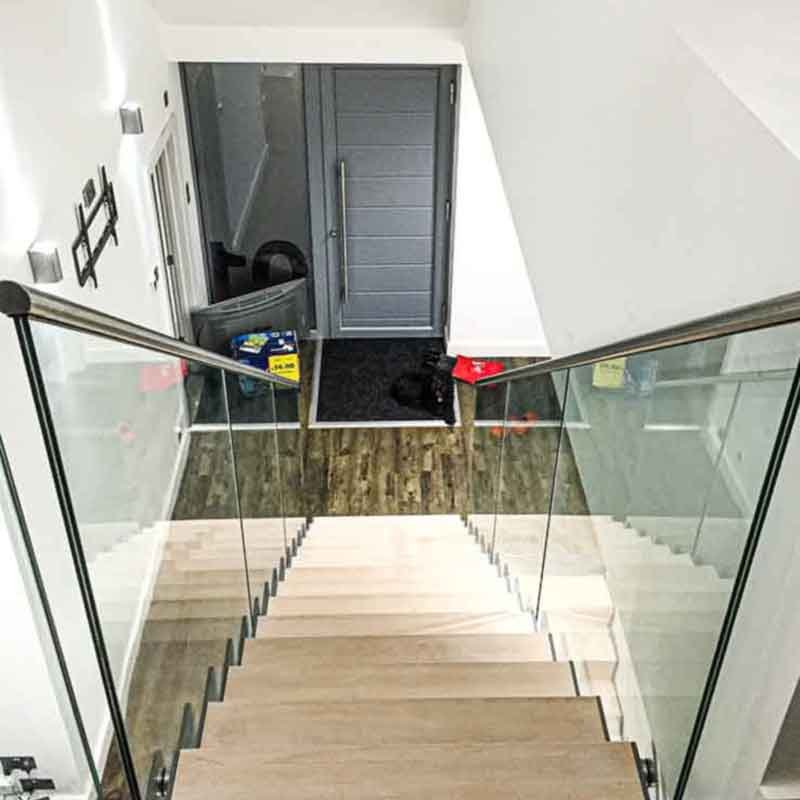 modern stair with glass panels