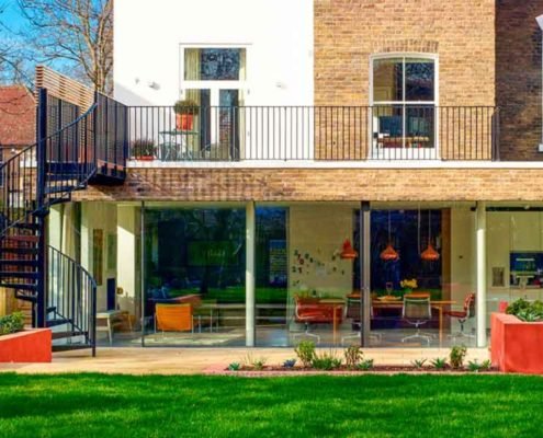 back of house with balcony