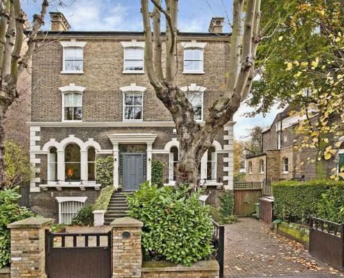 front of a large London townhouse