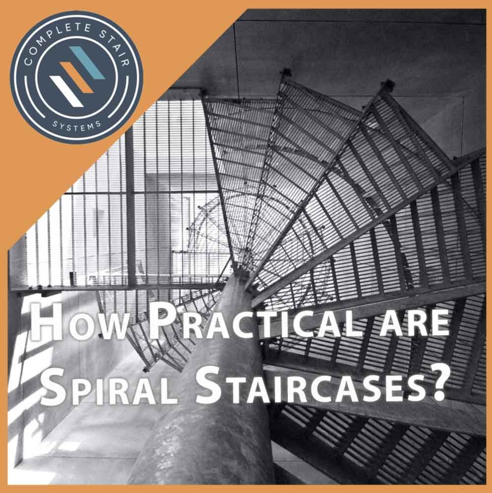 black and white shot of spiral stair from below