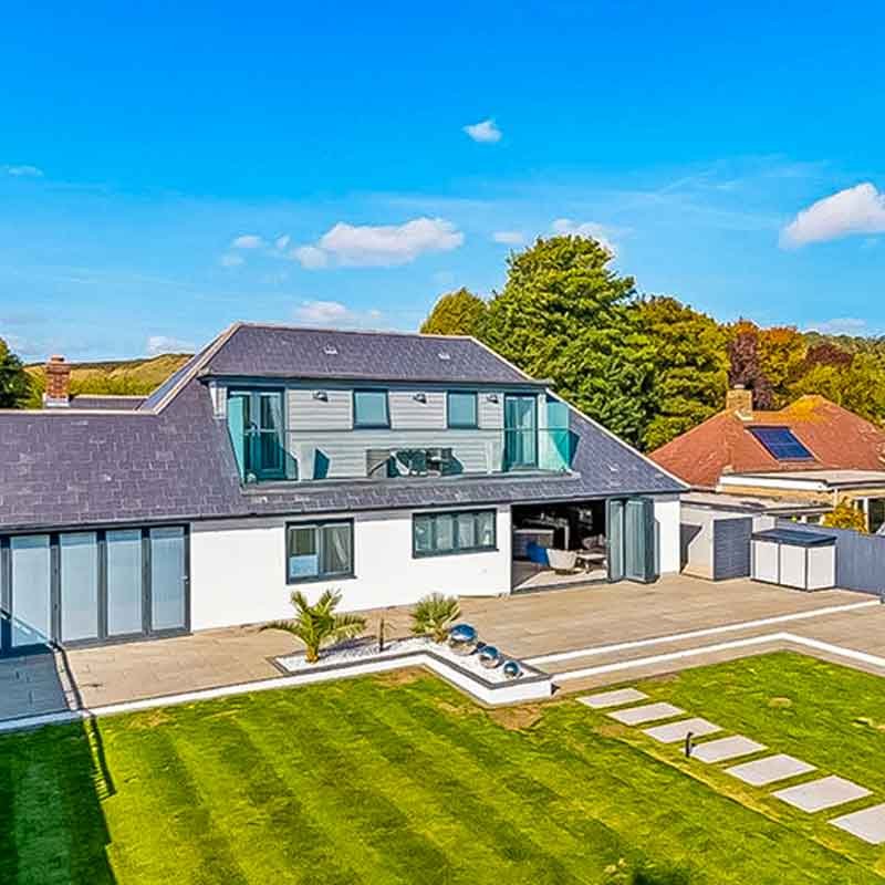 balcony overlooking grass to back of house