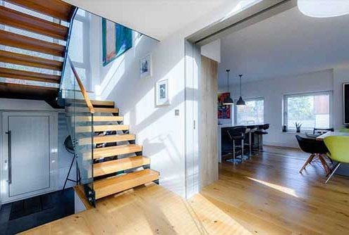 modern stair in Broughton with oak treads and glass balustrade