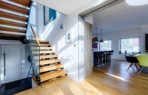 modern stair in Broughton with oak treads and glass balustrade