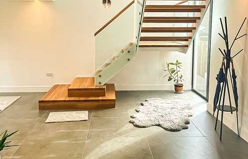 Quarter turn modern stair with large bottom oak steps