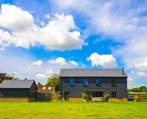 Modern-grey-house-with-large-green-garden