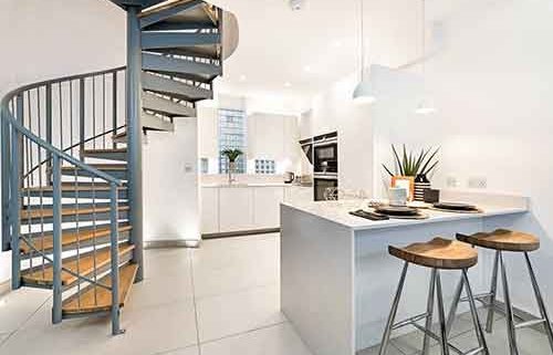 grey-steel-spiral-with-timber-steps-in-a-kitchen