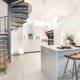 grey-steel-spiral-with-timber-steps-in-a-kitchen