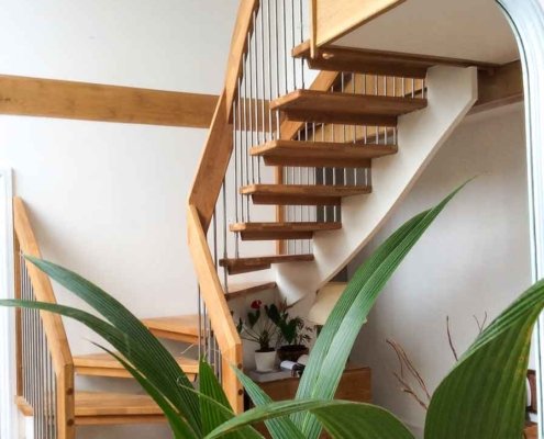 Oak-Staircase-Kingsbridge-with-green-plant-in-front