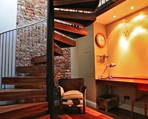 Walnut-spiral-stair-Chiswick-with-black-steelwork