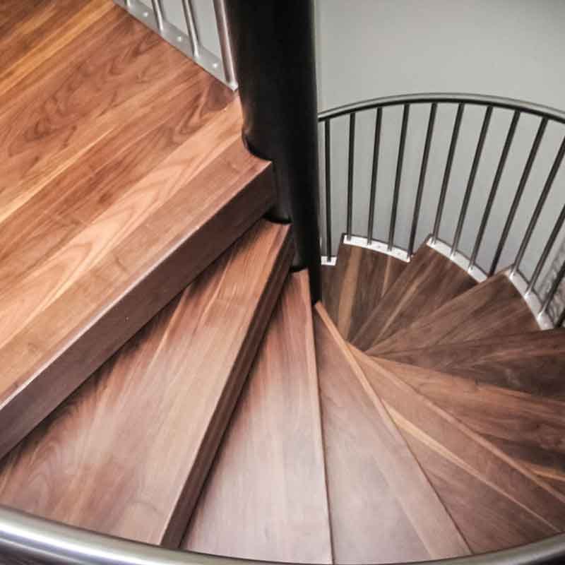 Walnut-steps-on-a-spiral-staircase-installed-in-chiswick