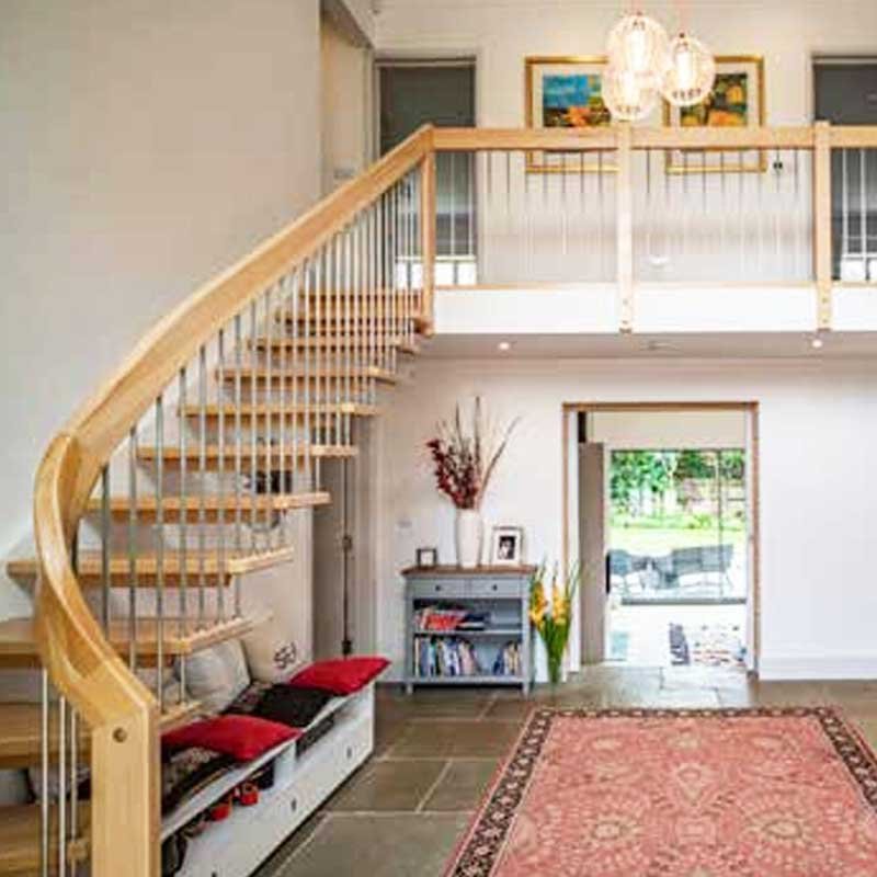 Floating-timber-stair-in-a-hallway