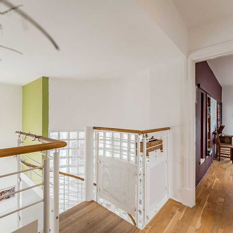 top-of-oak-and-steel-spiral-stair-in-a-house